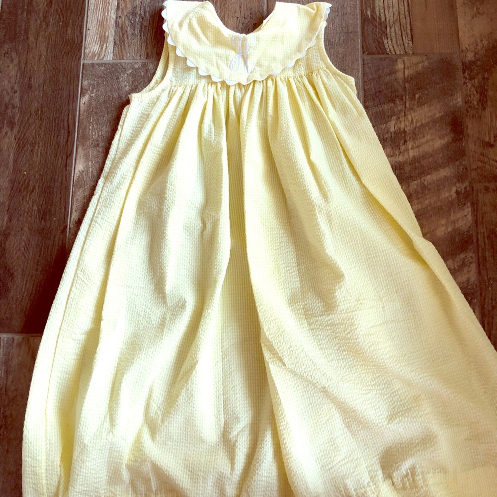 Yellow gingham dress with and H monogram